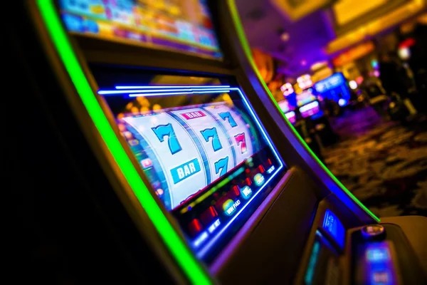thamuz Angka Main live-dealer studio showing Dragon Tiger, Sic Bo, and Roulette table setups