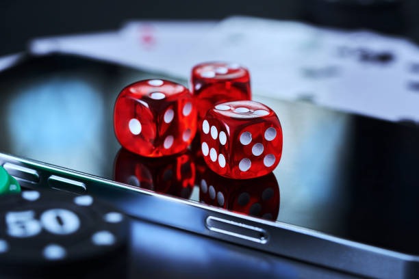 Mobile phone showing thamuz account dashboard with payment options and game categories